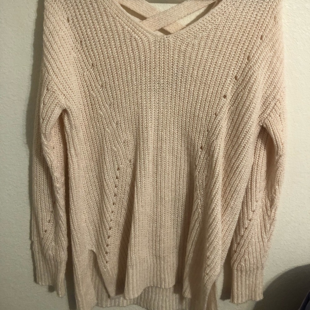 Large light pink knitted sweater